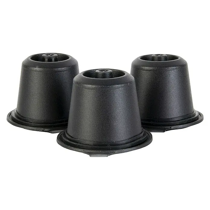 Cápsulas de café reutilizables - 3 ud., Específico para: Nespresso - Tres cápsulas de café negras alineadas sobre un fondo neutro. Perfecto para una preparación de café rápida y sencilla.