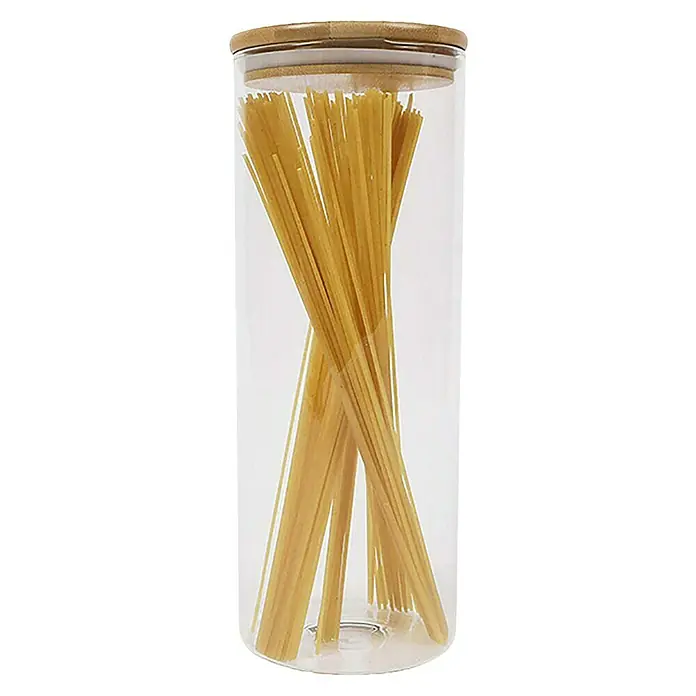 Frasco de vidrio con tapa - Ø x Al: 10,3 x 30 cm, 2 l - Un frasco de vidrio lleno de espaguetis, tapado con una tapa de madera. Perfecto para almacenar alimentos secos.