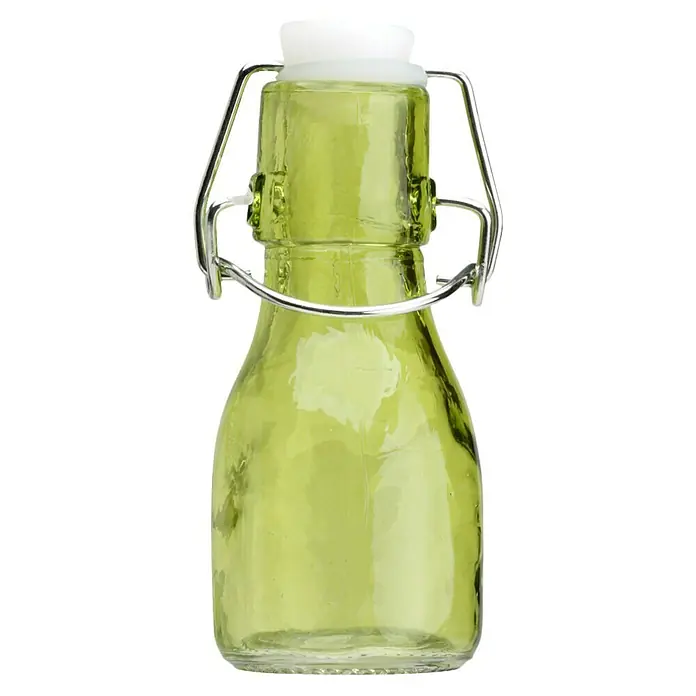 Especiero con cierre mecánico - 1 ud., 75 ml, Vidrio - Una botella de vidrio verde claro con tapón de ballesta y tapa de plástico blanca, ideal para embotellar y mantener líquidos frescos.