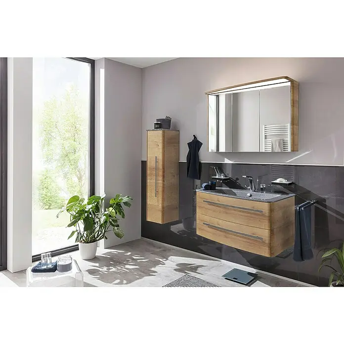 Lanzet Classico LED-Spiegelschrank - B x H: 104,8 x 70,2 cm, Mit Beleuchtung, Links, Berg Eiche - Modernes Badezimmer mit Waschtischunterschrank in Holzoptik, Spiegelschrank mit Beleuchtung und einer eleganten grauen Wandgestaltung.