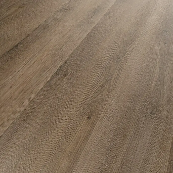 b!design Vinylbodenmuster Premium Windsor280 x 160 x 6,5 mm, Landhausdiele - Nahaufnahme eines Laminatbodens in Holzoptik, der eine warme und natürliche Atmosphäre vermittelt. Die Textur des Laminats ist gut sichtbar.