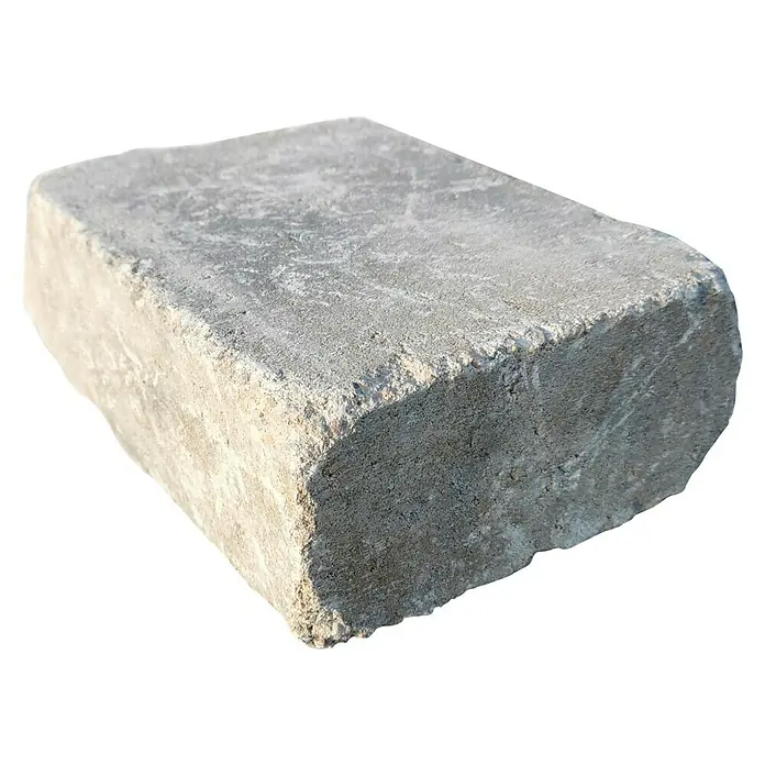 Diephaus Mauerstein Austin - 30 x 20 x 10 cm, Muschelkalk, Beton - Nahaufnahme eines einzelnen, rechteckigen Pflastersteins mit rauer Textur, ideal für Garten- und Landschaftsbauprojekte.