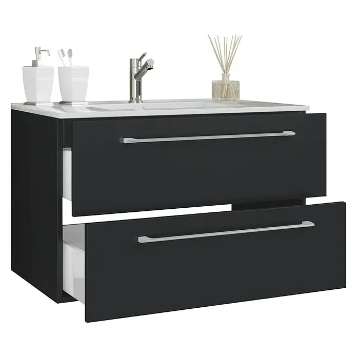 VCM Badinos Badmöbel-Set - 81 cm, Schwarz, 2 -tlg. - Bild eines modernen Badezimmerwaschtisches mit zwei Schubladen, Armatur, Seifenspender, Zahnbürstenhalter und Duftstäbchen.
