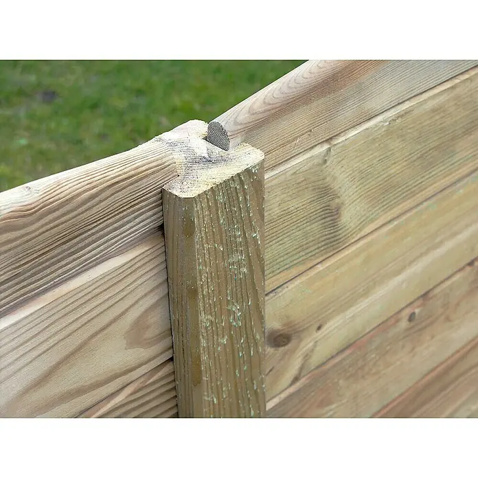 Cerland Friso machihembrado Lisa - Pino, L x An x Es: 200 cm x 12 cm x 22 mm - Primer plano de una valla de madera que muestra los detalles y la veta natural del material.