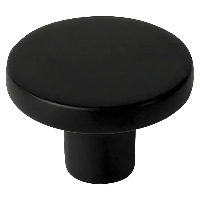 Nesu Pomo para muebles - Tipo de tirador del mueble: Botón, Ø x Al: 30 x 20 mm, Otros, Negro - Primer plano de un tirador de armario negro con una superficie lisa sobre un fondo oscuro.