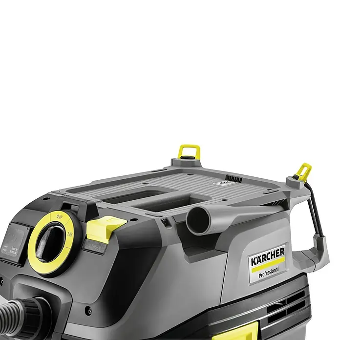 Kärcher Aspirador en seco y húmedo eléctrico NT 30/1 AP TE L - 1.380 W, Volumen de recipiente: 30 l, Sin bolsa - Detalle de una aspiradora Kärcher Professional para sólidos y líquidos, destacando sus detalles amarillos y controles.