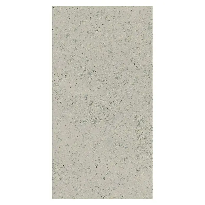 Suelo vinílico SPC Pantheon Stone - 610 x 305 x 5,2 mm - Primer plano de una encimera de cuarzo en gris elegante con motas sutiles, mostrando una superficie de cocina moderna y elegante.
