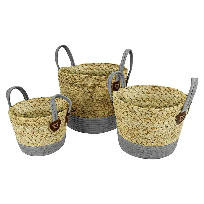 Korb Grasgeflecht - Natur/Grau, Ø x H: 25 x 20 cm - Drei geflochtene Körbe in verschiedenen Größen mit grauen Akzenten und Griffen für eine stilvolle Aufbewahrungslösung.