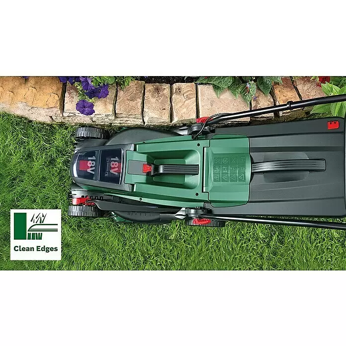 Bosch Power for All 18V Akku-Rasenmäher UniversalRotak 2x18V-37-550 - 18 V, Ohne Akku, Schnittbreite: 37 cm - Grüner und schwarzer Akku-Rasenmäher auf Gras neben einem Steinweg, betont seine Fähigkeit zum sauberen Kantenschnitt.