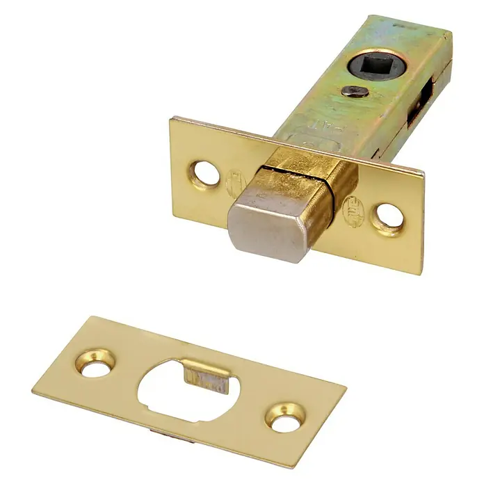 Picaporte 126 - Apto para: Puertas de madera, Latón - Primer plano de un pestillo tubular dorado y una placa de cerradero, perfecto para puertas interiores, combinando seguridad con estilo.