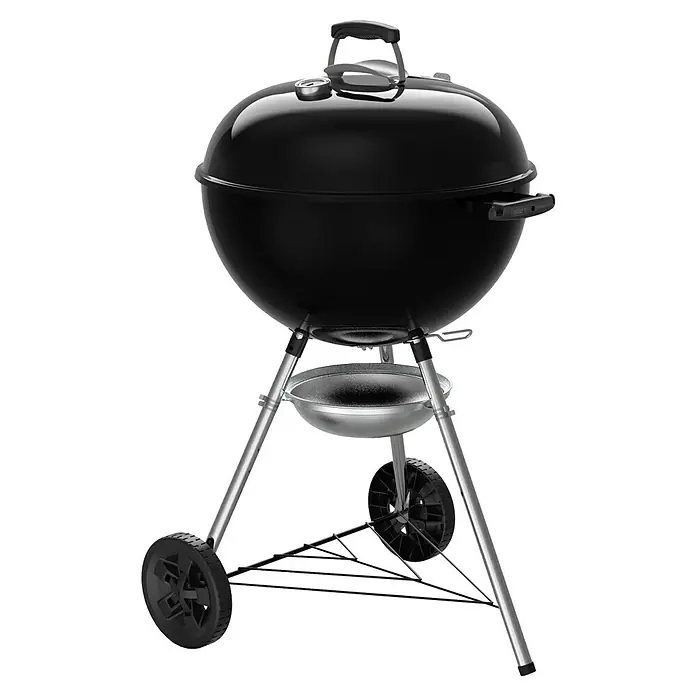 Weber Kugelgrill Original Kettle E-5710 - Durchmesser Grillfläche: 54 cm, Schwarz/Silber - Schwarzer Weber Holzkohlegrill mit silbernen Beinen und Rädern. Perfekt für sommerliche Grillabende im Garten.