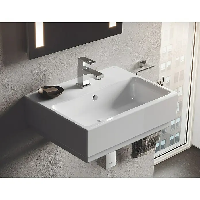 Grohe Eurocube Kaltwasser-Standventil XS-Size - Chrom, Glänzend - Ein modernes Waschbecken mit minimalistischem Design und einer klaren, rechteckigen Form, ideal für ein stilvolles Badezimmer.