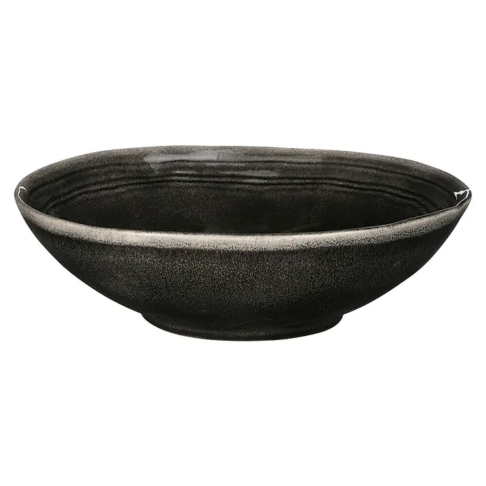 Schale Tabo - Ø x H: 30,5 x 9 cm, Schwarz - Nahaufnahme einer dunkelgrauen Keramikschale mit unregelmäßigem Rand, ideal für stilvolles Servieren von Speisen.\n