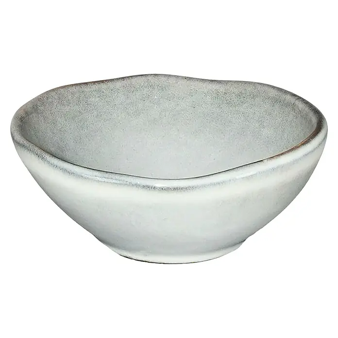 Schale Tabo - Ø x H: 8,5 x 3,5 cm, Grau - Nahaufnahme einer kleinen, grauen Keramikschale mit unregelmäßigem Rand, ideal für Dips oder kleine Snacks.
