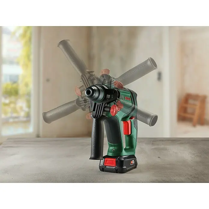 Bosch Professional AMPShare 18V Akku-Kombihammer UniversalHammer 18V - 18 V, 1 Akku, 4 Ah, 2 J - Akku-Bohrhammer von Bosch in Grün und Schwarz auf einem Tisch, der eine rotierende Bewegung demonstriert.