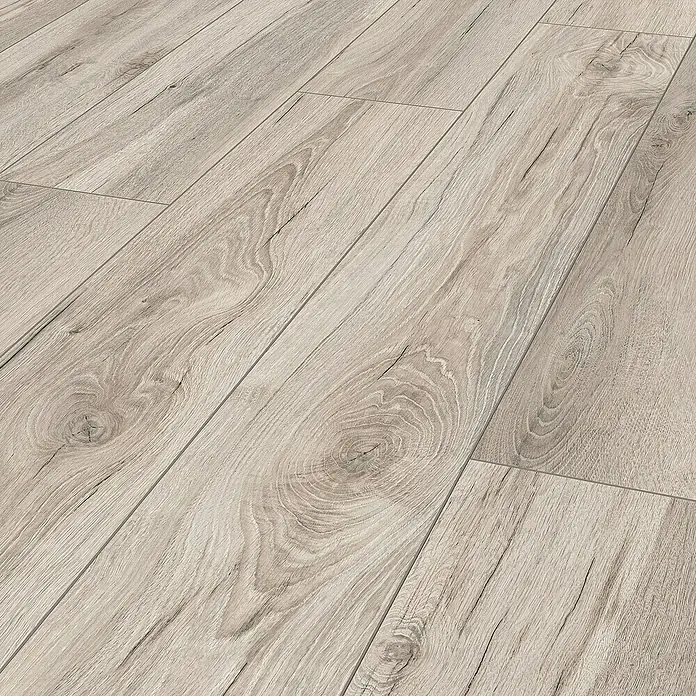 LOGOCLIC Aquaprotect Smart Laminat - Eiche Lucha, Landhausdiele, 1.288 x 195 x 6 mm - Nahaufnahme eines Laminatbodens mit hellem Holzdekor und realistischer Maserung, perfekt für moderne Wohnräume.