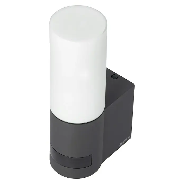 Steinel LED-Sensor-Außenwandleuchte L 605 S anthrazit - 11,3 W, L x B x H: 13,1 x 7,8 x 26 cm, Anthrazit, Warmweiß - Das Bild zeigt eine Steinel Außenleuchte mit Bewegungsmelder. Die Leuchte ist zylindrisch mit einem weißen Diffusor und einem dunklen Gehäuse.