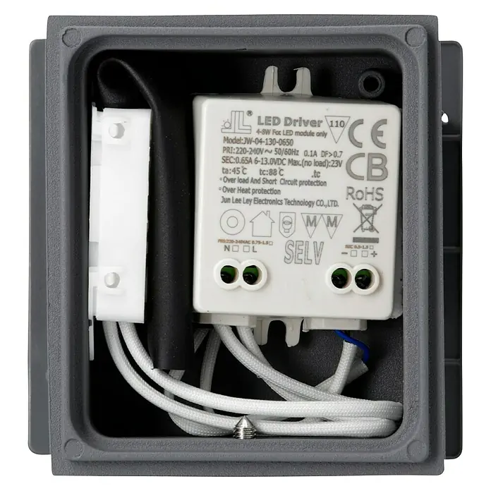 Starlux LED-Sensor-Außenwandleuchte Umea - 10 W, L x B x H: 10 x 10 x 10 cm, Anthrazit, Warmweiß - Nahaufnahme eines LED-Treibers in einem grauen Gehäuse, der Details wie Modellnummer und Leistungsdaten zeigt.