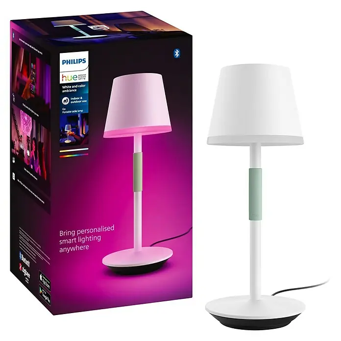 Philips Hue Akku-Tischleuchte Go Portable - 6,2 W, L x B x H: 21,9 x 20,9 x 38,8 cm, Mehrfarbig, Weiß - Das Bild zeigt eine Philips Hue Go tragbare Tischleuchte, die sowohl für den Innen- als auch für den Außenbereich geeignet ist.