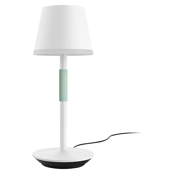 Philips Hue Akku-Tischleuchte Go Portable - 6,2 W, L x B x H: 21,9 x 20,9 x 38,8 cm, Mehrfarbig, Weiß - Ein elegantes, weißes Hue Tischleuchte mit einem grünen Akzent und einem stilvollen Design. Perfekt für modernes Ambiente und gemütliche Beleuchtung.