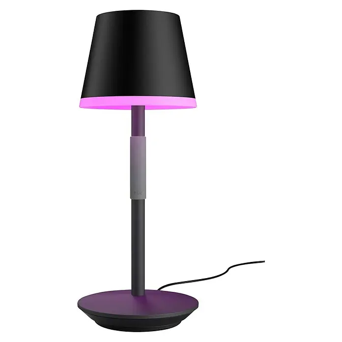 Philips Hue Akku-Tischleuchte Go Portable - 6,2 W, L x B x H: 21,9 x 20,9 x 38,8 cm, Mehrfarbig, Schwarz - Elegante Tischleuchte mit schwarzem Schirm und violettem Lichtakzent, die eine moderne Atmosphäre schafft.