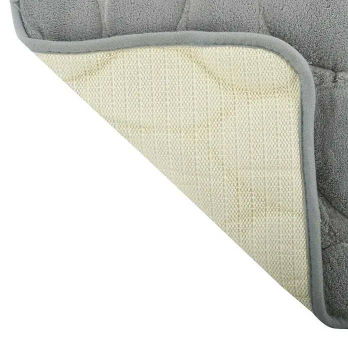 MSV Alfombra de baño Piedras - 60 x 40 cm, Poliéster, Gris - Primer plano de un protector de colchón acolchado gris con base antideslizante, ideal para mayor comodidad y estabilidad.