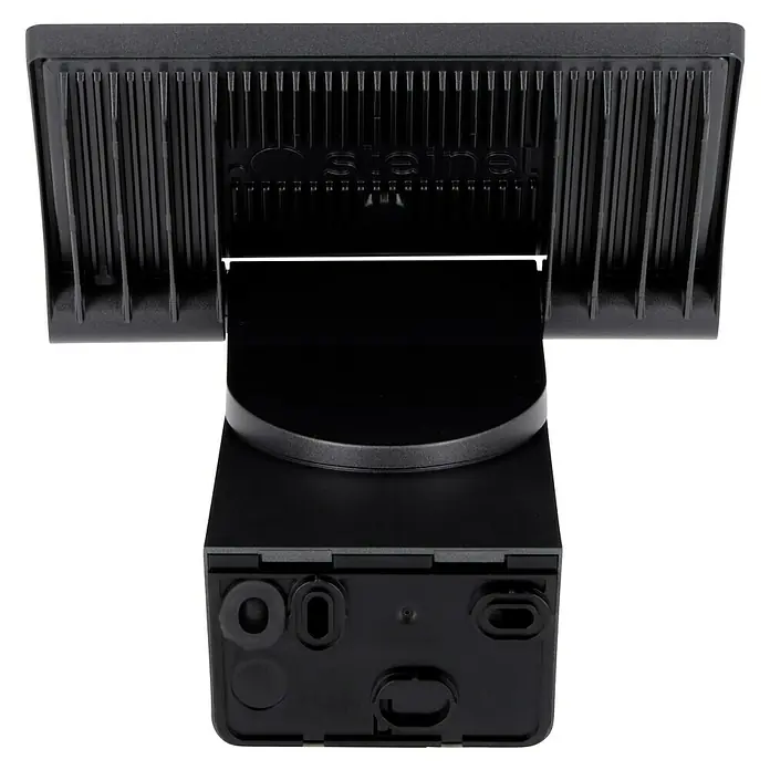 Steinel LED-Sensor-Strahler XLED home 2 S graphit - 13,7 W, L x B x H: 161 x 180 x 218 mm, Graphit, IP44 - Nahaufnahme einer schwarzen Steinel-Außenleuchte, die mit ihren Kühlrippen und Anschlüssen eine robuste Bauweise für den Außenbereich zeigt.