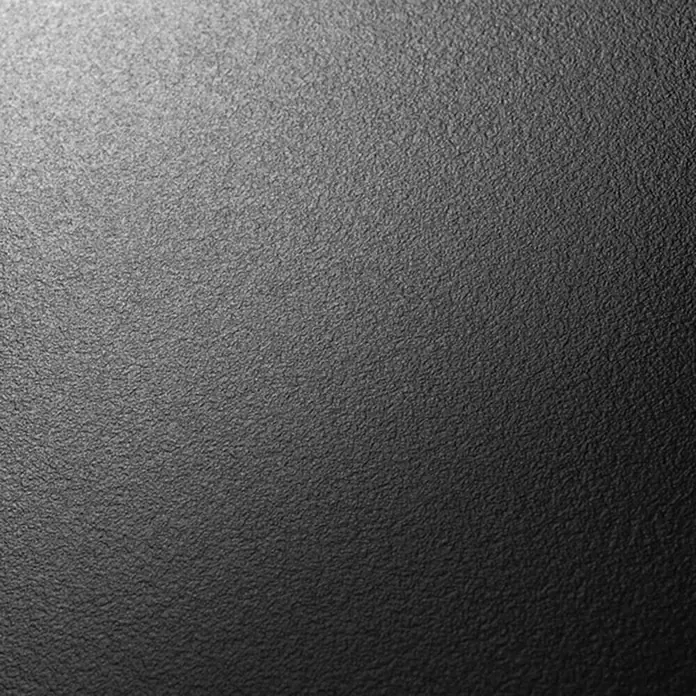 MDF-Platte Fixmaß - Anthrazit, 1.398 x 1.033 x 10 mm - Nahaufnahme einer strukturierten, matten schwarzen Oberfläche, ideal für Hintergründe und Texturen.