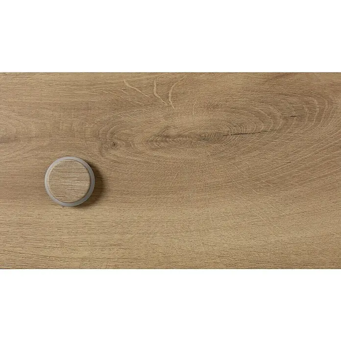 Inofix Tope de puerta 2098 - Ø x Al: 46 x 18 mm, fresno Calcáreo - Primer plano de un cajón de madera clara con un tirador redondo a juego y una veta sutil, ideal para muebles minimalistas.