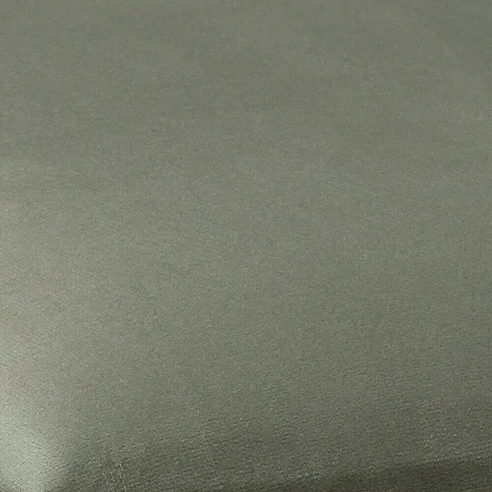 Fllow Wandpolster Jar - Minze, 30 x 30 cm - Nahaufnahme einer grauen, strukturierten Oberfläche, die durch subtile Farbnuancen und leichte Schattierungen Tiefe erhält. Ideal für Hintergründe.