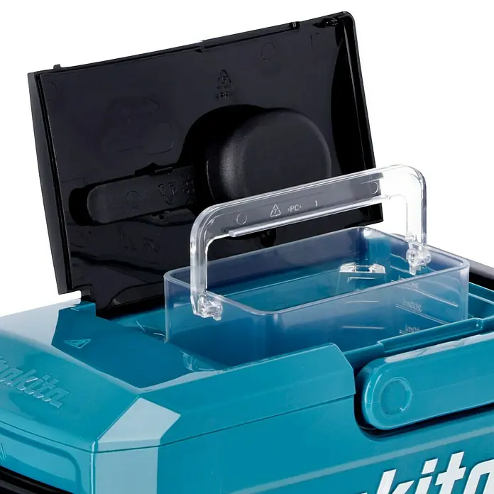 Makita LXT 18V Akku-Kaffeemaschine DCM501Z - 18 V, Ohne Akku, Behältervolumen: 0,24 l - Detailaufnahme eines Makita-Produktes mit einem transparenten Behälter und einem schwarzen Deckel, der die Marke und Funktionalität hervorhebt.