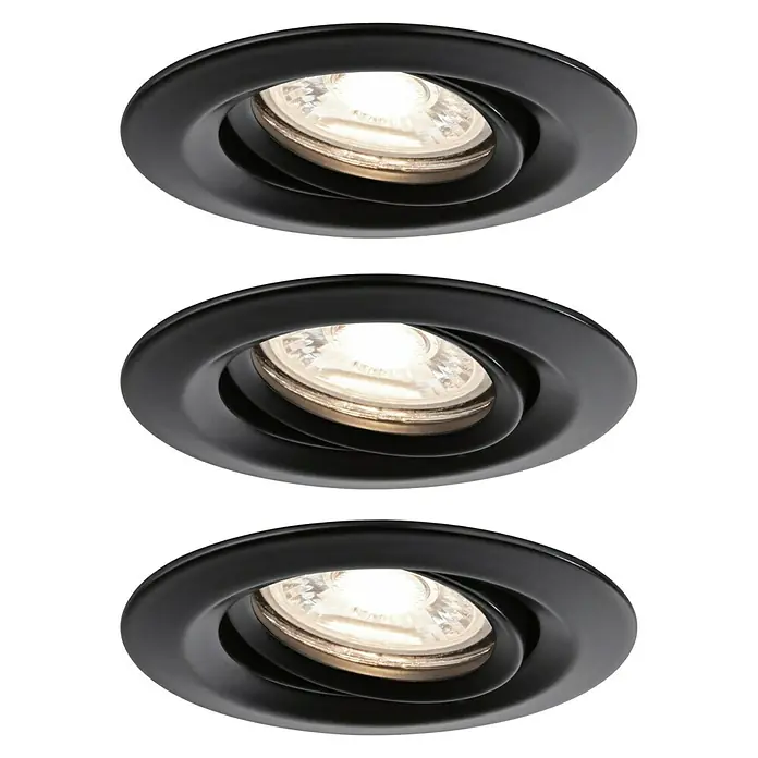 Paulmann LED-Einbauleuchten-Set rund Nova Mini Coin - 4 W, Ø x H: 6,6 x 3 cm, Schwarz, 3 Stk., Schwenkbar - Nahaufnahme von drei schwarzen Einbaustrahlern, die ein warmes Licht ausstrahlen und eine moderne Beleuchtungslösung darstellen.