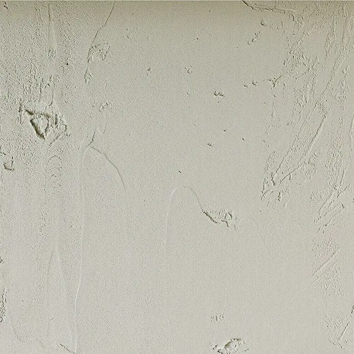 SCHÖNER WOHNEN-Farbe Trendstruktur Dekoputz-Set Sichtbeton-Optik - 3 -tlg. - Nahaufnahme einer beigen Wand mit strukturierter Putzoberfläche, die ein subtiles, natürliches Muster zeigt. Ideal für Hintergründe.