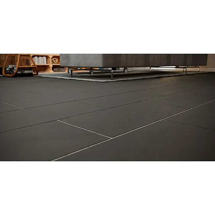 Ambiente by Palazzo Feinsteinzeugfliese - 30 x 60 cm, Schwarz, Matt - Nahaufnahme von eleganten, anthrazitfarbenen Bodenfliesen mit feinen Fugenlinien, die ein modernes und stilvolles Ambiente schaffen.