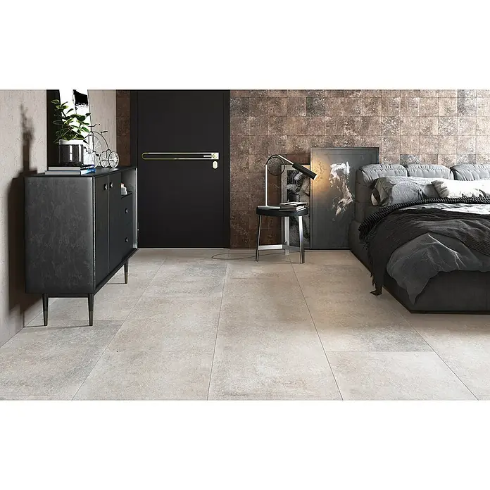 RAK Ceramics Terrassenfliese Volterra 2.0 - 60 x 120 x 2 cm, Sandgrau, Matt - Elegante Schlafzimmereinrichtung mit einem modernen, grauen Nachttisch, der durch sein schlichtes Design und die hochwertige Verarbeitung besticht.