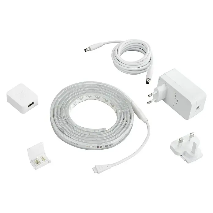 Philips Hue LED-Band Plus Basis - 2 m, RGBW - Bild eines LED-Lichtstreifens mit Zubehör. Enthält Kabel, Stecker und Controller, alles in Weiß auf schwarzem Hintergrund.