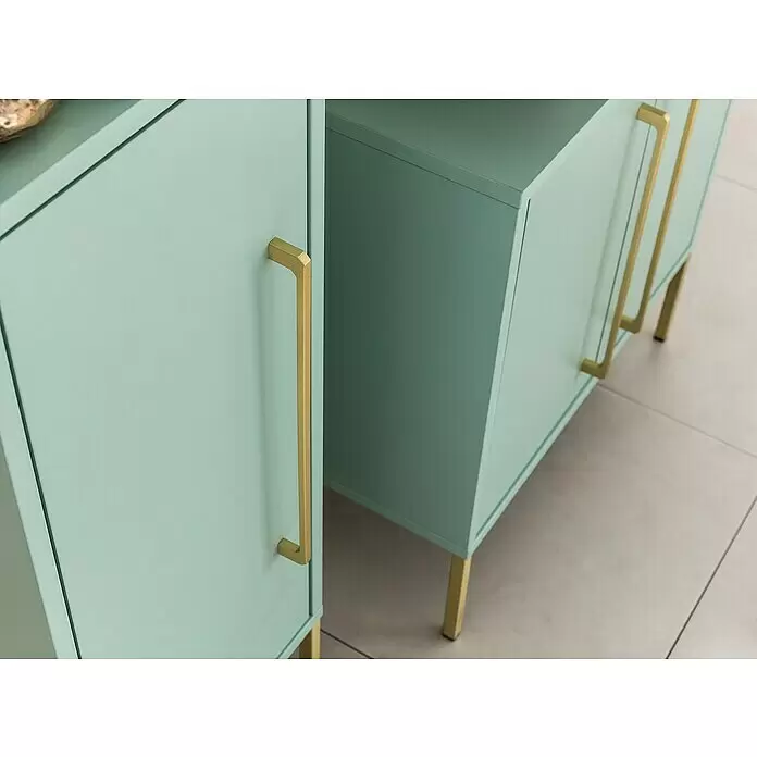 Schildmeyer Sarah Waschtischunterschrank - 57,1 x 30,1 x 61,2 cm, Mint, Matt - Hellgrüne Schranktüren mit eleganten goldenen Stangengriffen und goldenen Beinen, Teil moderner Möbel.