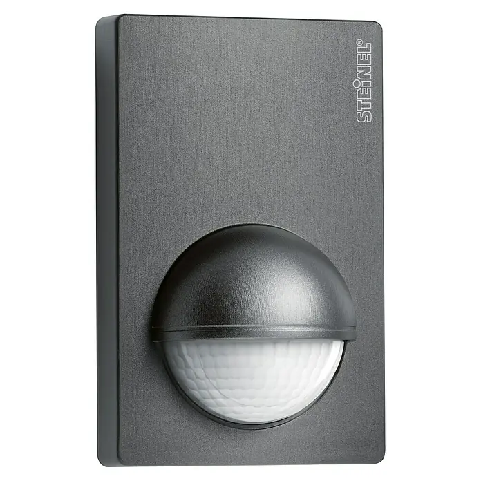 Steinel Bewegungsmelder IS 180-2 anthrazit - Reichweite Sensor: 12 m, Anthrazit, Erfassungswinkel Sensor: 180 °, L x B x H: 56 x 76 x 120 mm - Das Bild zeigt einen STEINEL Bewegungsmelder in dunkler Ausführung, ideal für den Außenbereich zur automatischen Lichtsteuerung.