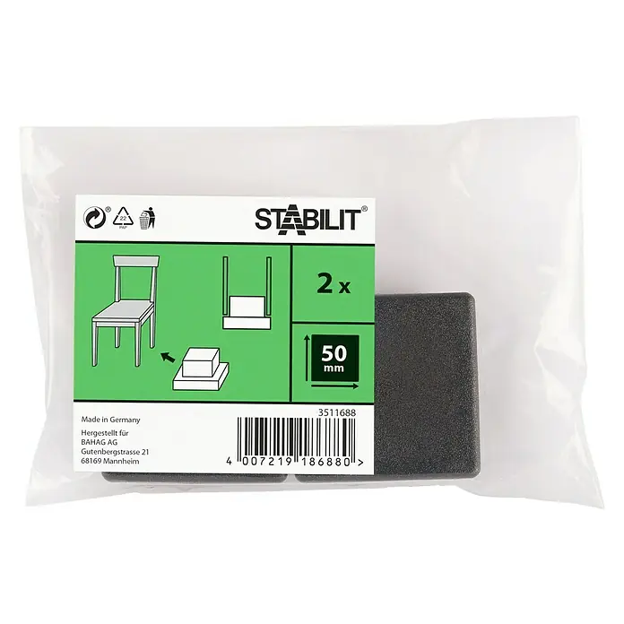 Stabilit Protector para muebles - An x L: 50 x 50 mm, Negro, 2 ud. - Imagen de un paquete con dos deslizadores para muebles Stabilit, de 50 mm de ancho, empaquetados en una bolsa de plástico transparente.