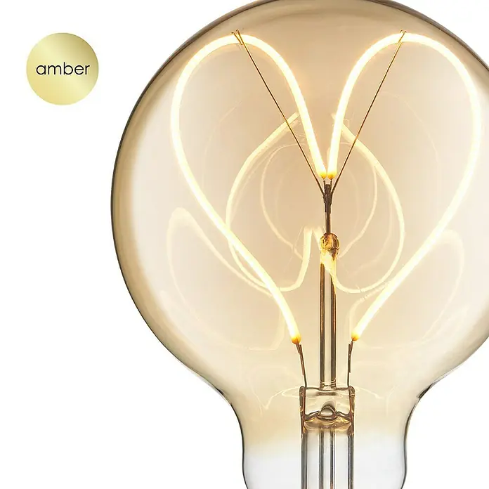 Home Sweet Home LED-Lampe Heart Vintage Globe-Form E27 - E27, Dimmbar, Warmweiß, 280 lm, 4 W - Nahaufnahme einer dekorativen Amber-Glühbirne mit glühenden Filamenten.