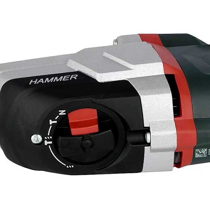 Metabo Kombihammer KHE 2860 Quick Set - 880 W, 3,2 J, SDS-Plus-Aufnahme - Nahaufnahme des silbernen und schwarzen Gehäuses eines Bohrhammers mit roten Akzenten, Funktionswahlschalter ('N', Hammermodi) und rotem Knopf.