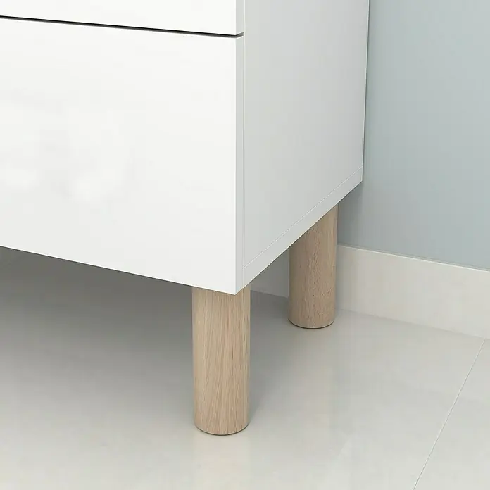 Rei Pata para muebles - L x An x Al: 5,8 x 5,8 x 15 cm, Capacidad de carga: 20 kg, Madera - Primer plano de un armario blanco con patas de madera clara, sobre un suelo blanco elegante. Diseño de muebles sencillo y moderno.