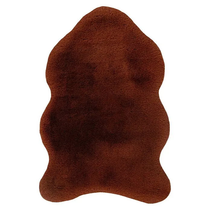 Kunstfell Happy - Terra, 90 x 60 cm, 100 % Polyester (Flor) - Brauner Teppich in Form eines Tierfells. Der Teppich ist weich und kuschelig und hat eine unregelmäßige Form, die an ein Tierfell erinnert.