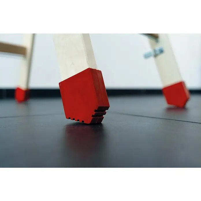 Krause Fußkappen Stabilo - L x B x H: 23 x 12 x 3 cm - Nahaufnahme der roten Gummifüße einer Leiter, die für Stabilität und Schutz auf glatten Oberflächen sorgen. Die Füße verhindern Rutschen und Beschädigungen.