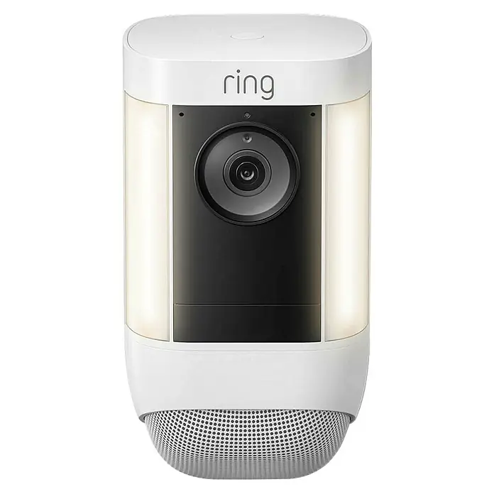 Ring Überwachungskamera Spotlight Cam Pro Battery - Weiß, Auflösung: 1.080 Pixel (Full HD), Akku - Nahaufnahme einer Ring Sicherheitskamera in Weiß, mit integrierten Lichtern für verbesserte Überwachung und Sicherheit.