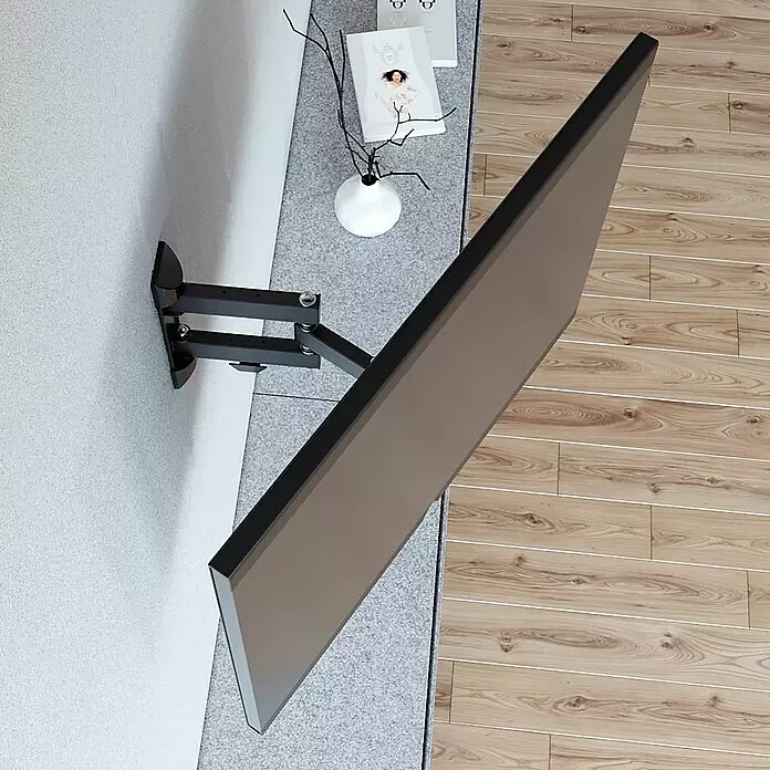 Hama TV-Wandhalterung schwenkbar - Passend für: Bildschirmdiagonale 19 - 48″, 48 - 122 cm, Belastbarkeit: 20 kg, Wandabstand: 5,6 cm - 31,6 cm - Schwarze schwenkbare TV-Wandhalterung hält einen großen Flachbildfernseher.