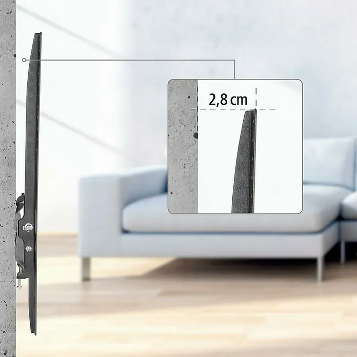 Hama TV-Wandhalterung neigbar - Passend für: Bildschirmdiagonale 32 - 65″, 81 - 165 cm, Belastbarkeit: 35 kg, Wandabstand: 2,8 cm - Das Bild zeigt eine Nahaufnahme einer an der Wand montierten TV-Halterung, wobei der Abstand zur Wand nur 2,8 cm beträgt.