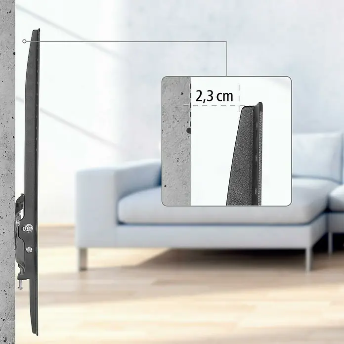 Hama TV-Wandhalterung starr - Passend für: Bildschirmdiagonale 32 - 65″, 81 - 165 cm, Belastbarkeit: 35 kg, Wandabstand: 2,3 cm - Nahaufnahme einer TV-Wandhalterung, die einen minimalen Abstand von 2,3 cm zur Wand zeigt. Die schlanke Bauweise sorgt für eine unauffällige Montage.