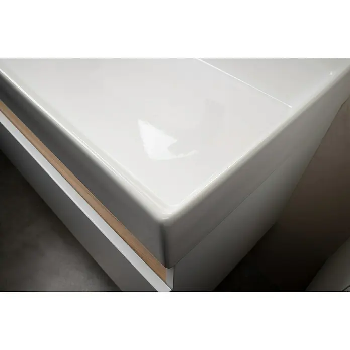 Camargue Nature Einbauwaschbecken60 x 45 cm, Weiß - Nahaufnahme eines glänzenden, weißen Möbelstücks, das eine moderne und minimalistische Ästhetik verkörpert. Elegantes Design mit klaren Linien.