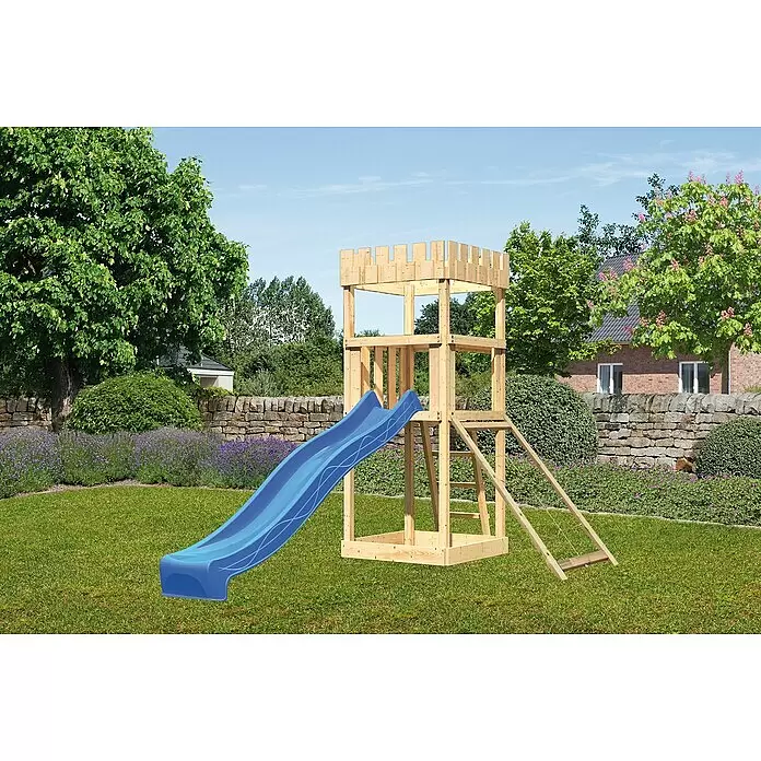 Karibu Kinderspielturm Ritterburg Löwenherz Set 15 - L x B x H: 107 x 107 x 259,5 cm, Natur/Blau - Hölzerner Spielturm mit blauer Rutsche, einem Schloss ähnelnd, in einem grünen Garten.